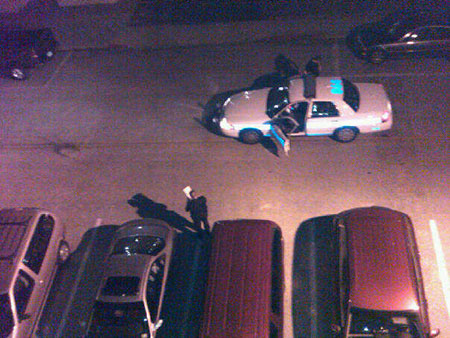 Cops about to tow away a car whose alarm was blaring all night long.