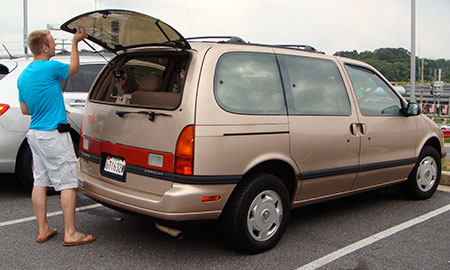 Russell and his 1994 Mercury Villager